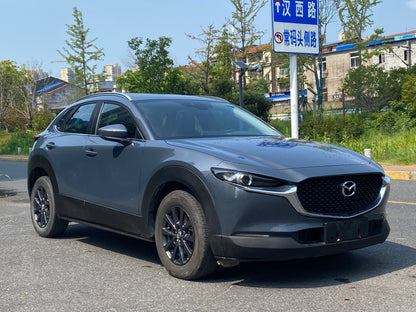 Автомобиль CX-30 2020 года, 2,0 л, автомобильный двигатель.