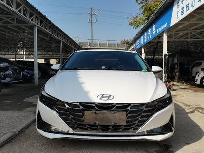 Hyundai Elantra 2022 передний вид · решётка радиатора